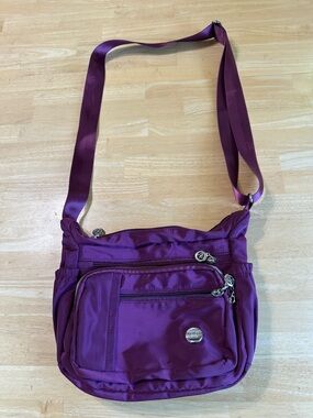 Compact Purple Crossbody Bag with Front Zip Pockets